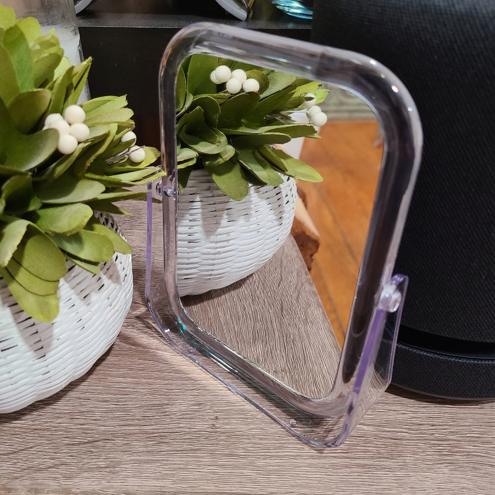 Rectangular vanity mirror with clear frame